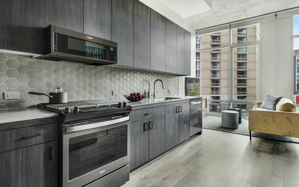 One Chicago Multi-family Highrise Cabinetry Project Install by Quest Engineering.